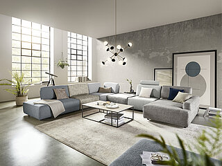 Modulsofa MR 9420 in Stoff grau-blau mit Teppich der Deluxe Collection COLORADO CLASSIC in Fb. beige-grau von Musterring