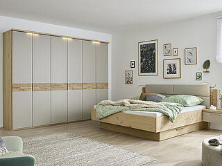 Kleiderschrank und Bett Minto 2.0 in Balkeneiche und Lack Basalt von Musterring