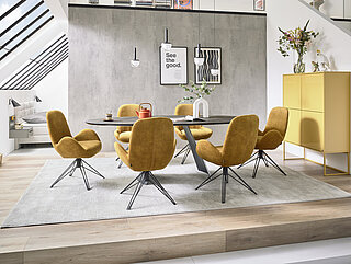 Esstisch (7015), Platte Keramik Rock schwarz gold (PG 1), ovale Form, Metallgestell Wange gerundet, pulverbeschichtet schwarz, ca. L 220, B 100, H 76 cm